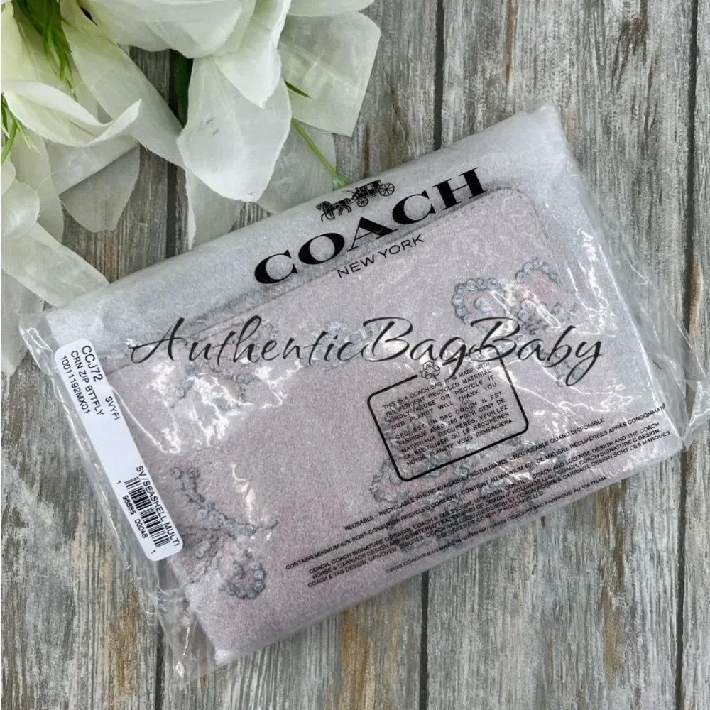 Coach Pink Butterfly Leather Wristlet